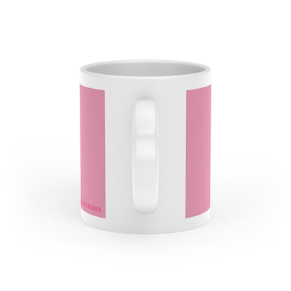 Rückansicht der Kefir Lover Keramiktasse mit rosa Design, weißem Mittelstreifen und weißem Henkel.