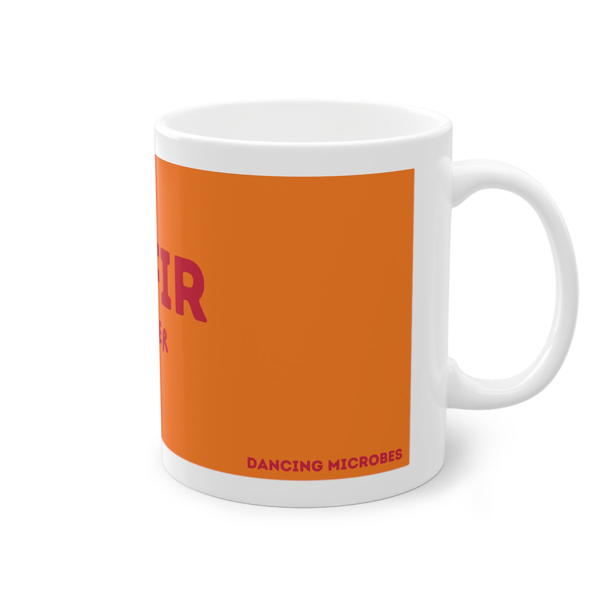Orangefarbene Keramiktasse mit weißem Henkel auf der rechten Seite und teilweise sichtbarem Kefir Lover Schriftzug.